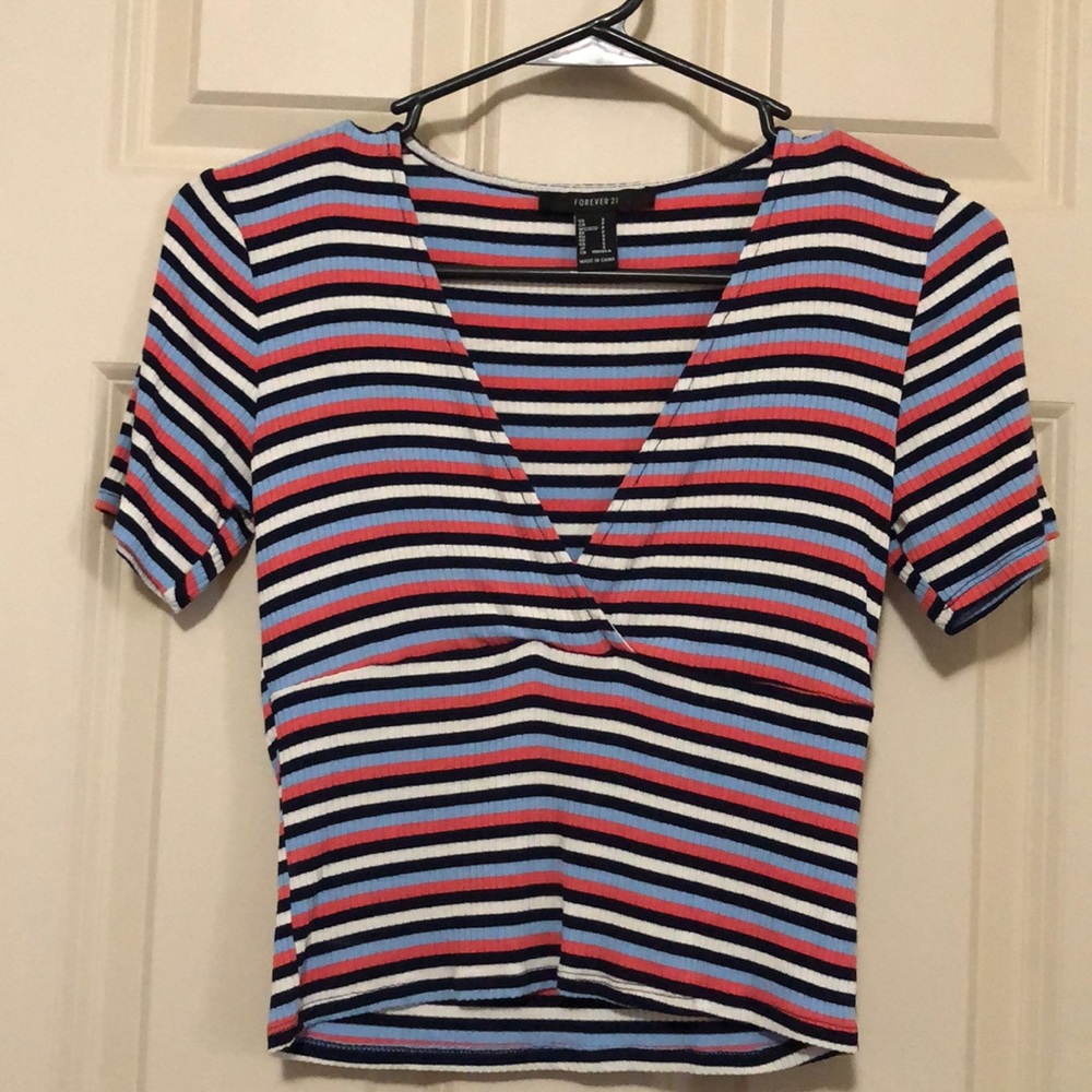 Crop top. White, print, baby blue, ad navy blue stripes.